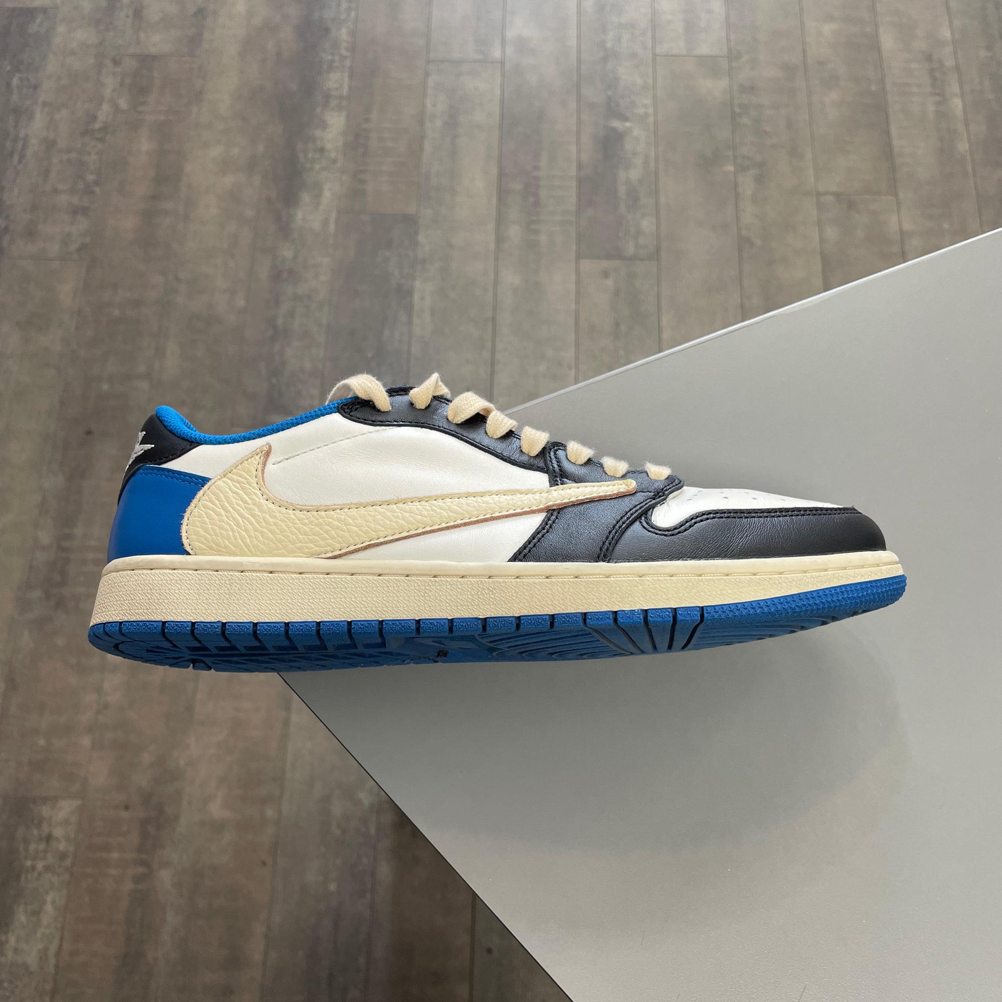 Jordan 1 Low Travis Fragment