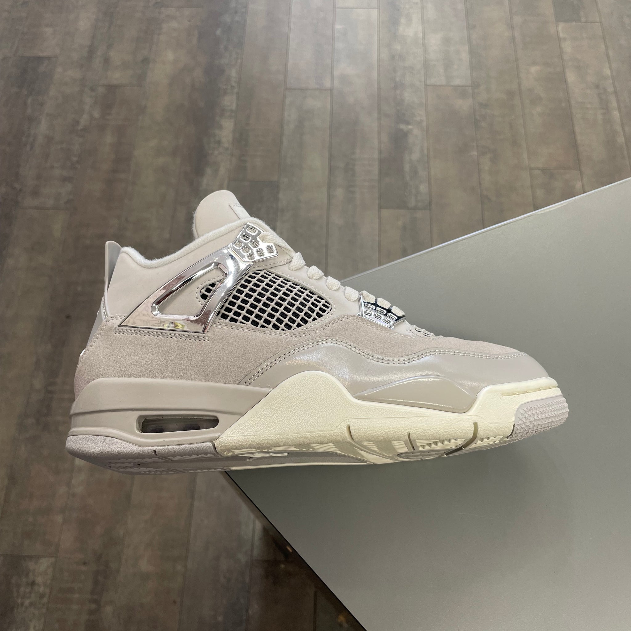 Jordan 4 Frozen Moments